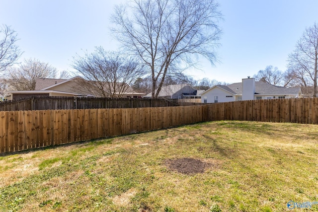 view of yard with fence