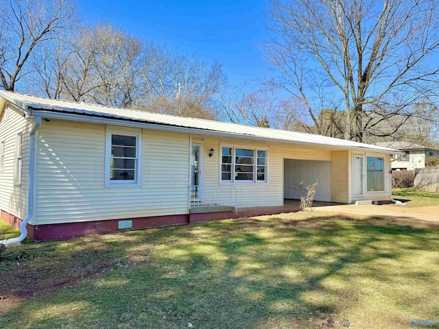 view of front facade with a front lawn, crawl space, and metal roof