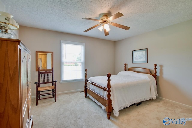 24430 Chadwick Dr, Athens, AL 35613 - bedroom featuring light carpet, a textured ceiling, and ceiling fan