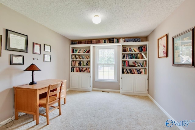 24430 Chadwick Dr, Athens, AL 35613 - carpeted office featuring a textured ceiling and baseboards