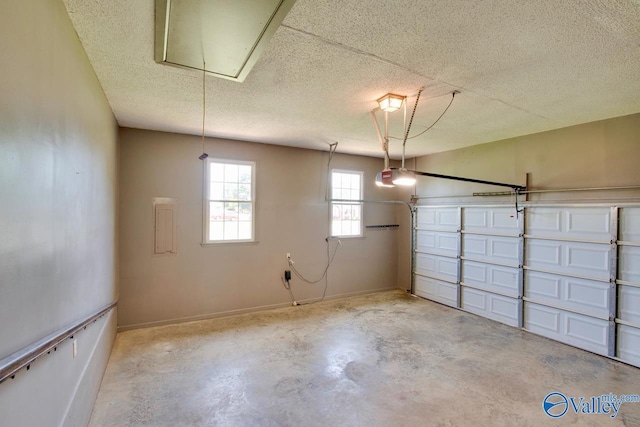 24430 Chadwick Dr, Athens, AL 35613 - garage with a garage door opener and baseboards