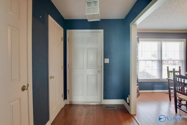 24430 Chadwick Dr, Athens, AL 35613 - entryway with a textured ceiling and hardwood / wood-style flooring