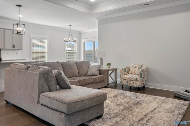 living room featuring crown molding and dark hardwood / wood-style flooring