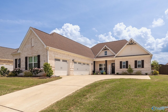 202 Maureen Dr, Madison, AL 35756 - craftsman house featuring brick siding, a front yard, an attached garage, and concrete driveway