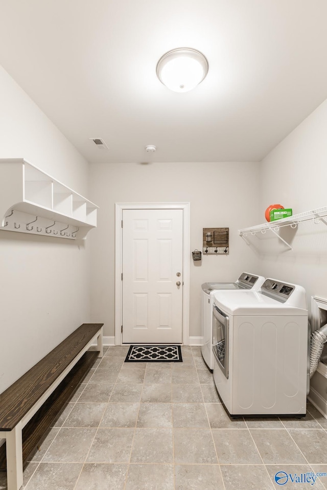 202 Maureen Dr, Madison, AL 35756 - laundry room with washer and dryer and baseboards