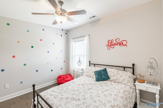 202 Maureen Dr, Madison, AL 35756 - bedroom with baseboards, wood finished floors, and ceiling fan