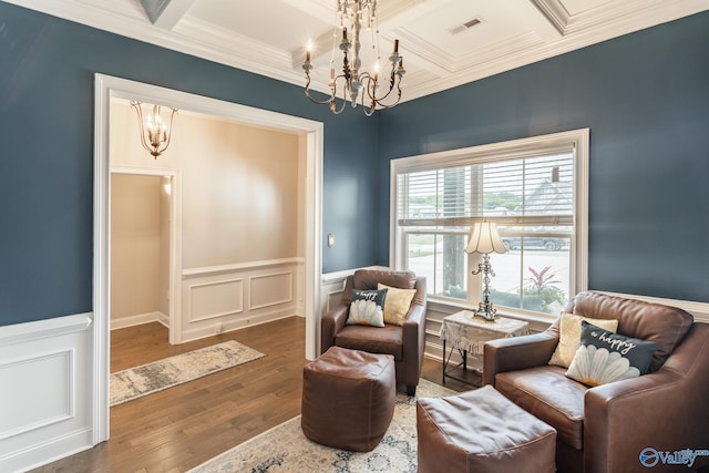 202 Maureen Dr, Madison, AL 35756 - sitting room featuring crown molding, coffered ceiling, a chandelier, dark wood-type flooring, and a wainscoted wall