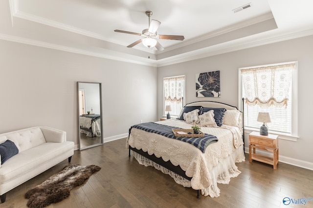 202 Maureen Dr, Madison, AL 35756 - bedroom featuring a raised ceiling, dark wood-style flooring, baseboards, crown molding, and a ceiling fan