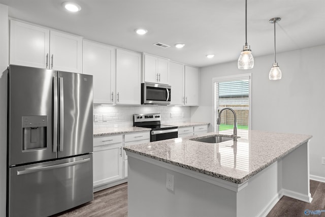 103 Gander Cir, Owens Cross Roads, AL 35763 - kitchen with stainless steel appliances, dark wood-style flooring, backsplash, white cabinets, and recessed lighting