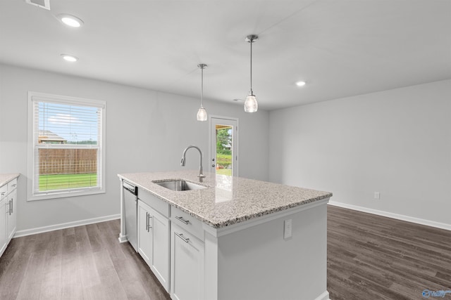 103 Gander Cir, Owens Cross Roads, AL 35763 - kitchen with dark wood finished floors, a kitchen island with sink, hanging light fixtures, white cabinets, and recessed lighting