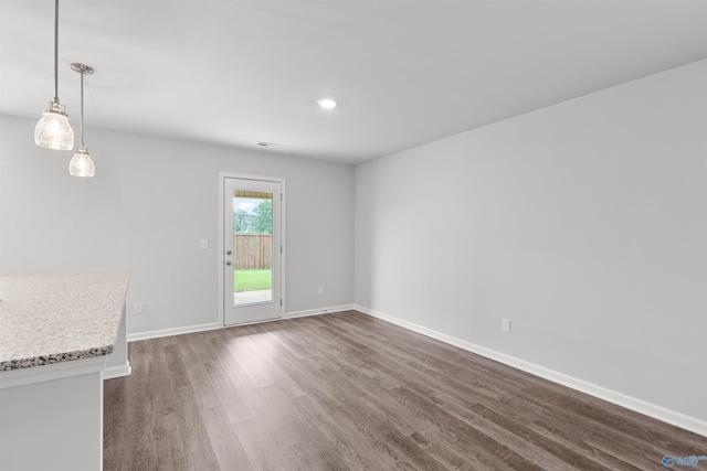 103 Gander Cir, Owens Cross Roads, AL 35763 - unfurnished living room featuring dark wood finished floors and baseboards