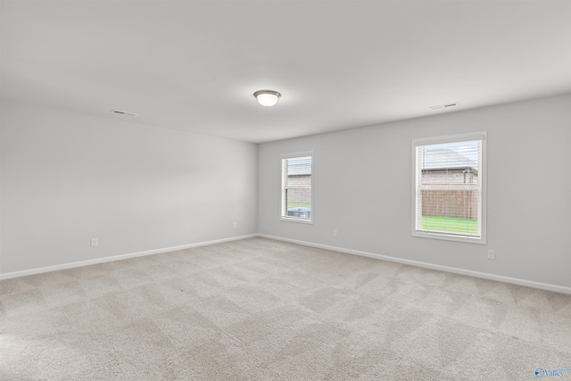 103 Gander Cir, Owens Cross Roads, AL 35763 - spare room with light carpet and baseboards
