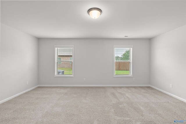 103 Gander Cir, Owens Cross Roads, AL 35763 - empty room with light carpet