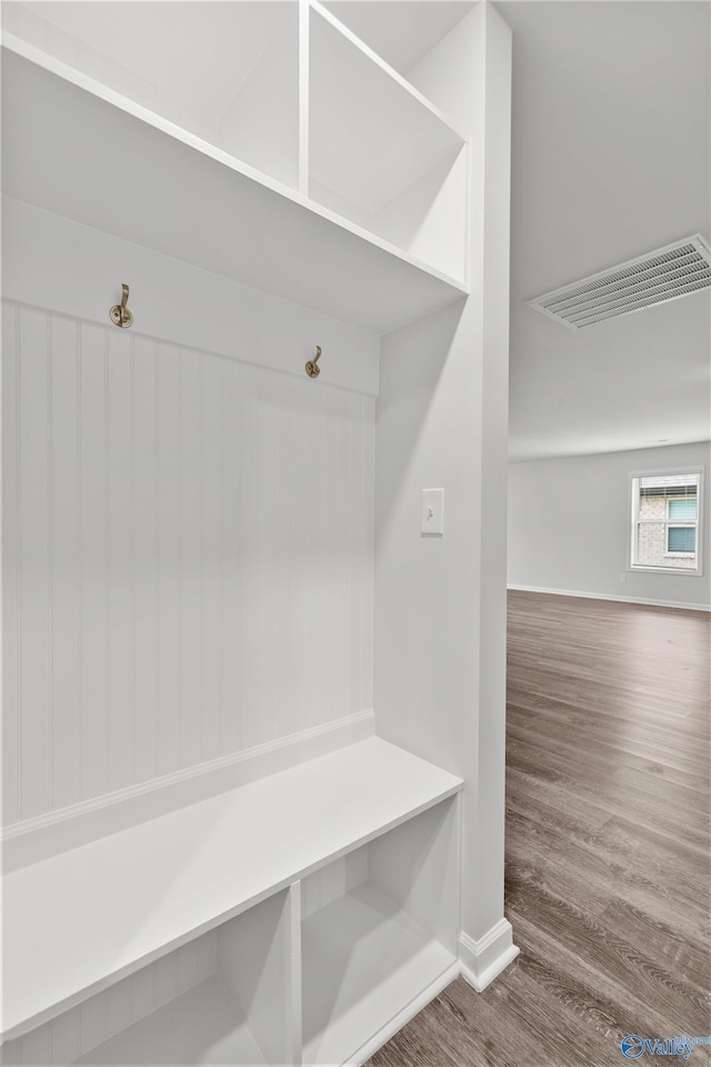 103 Gander Cir, Owens Cross Roads, AL 35763 - mudroom featuring wood finished floors and baseboards