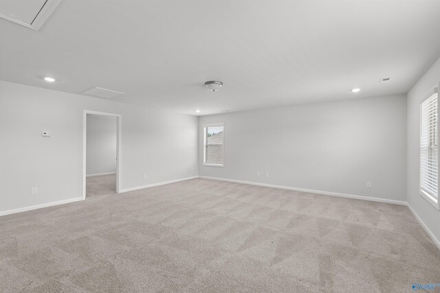 103 Gander Cir, Owens Cross Roads, AL 35763 - spare room with recessed lighting, light carpet, and attic access