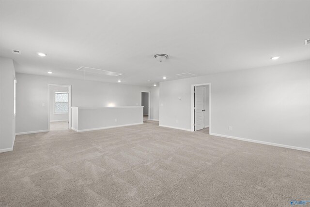 103 Gander Cir, Owens Cross Roads, AL 35763 - spare room with attic access, recessed lighting, and light colored carpet