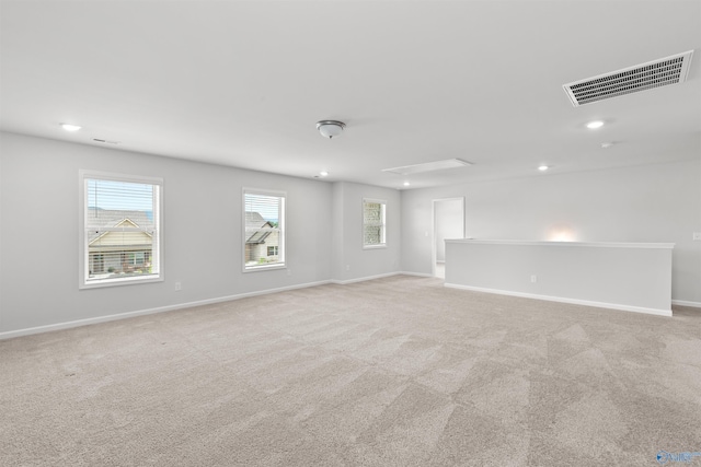 103 Gander Cir, Owens Cross Roads, AL 35763 - spare room with attic access, light carpet, and recessed lighting