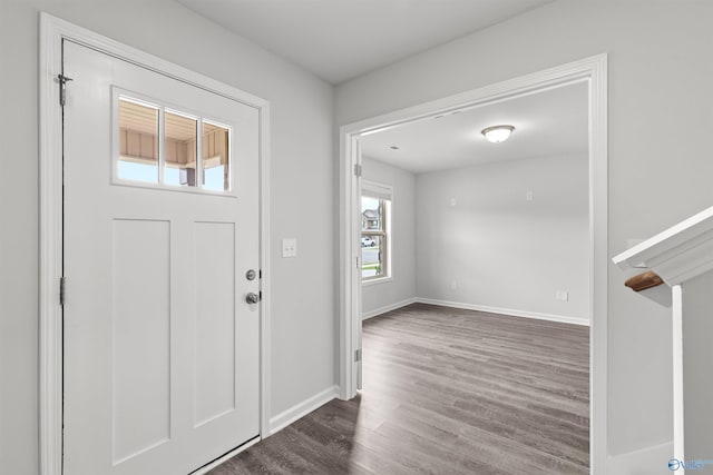 103 Gander Cir, Owens Cross Roads, AL 35763 - foyer entrance featuring dark wood-style floors and baseboards