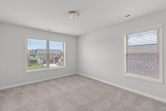 103 Gander Cir, Owens Cross Roads, AL 35763 - carpeted empty room featuring baseboards