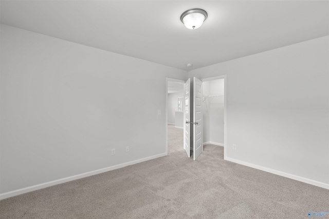 103 Gander Cir, Owens Cross Roads, AL 35763 - empty room with carpet floors and baseboards