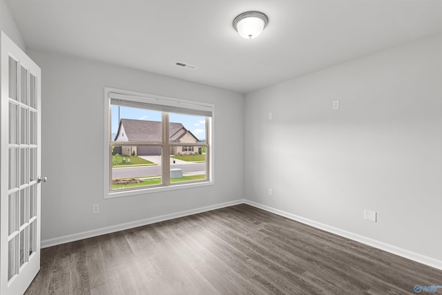 103 Gander Cir, Owens Cross Roads, AL 35763 - spare room featuring dark wood-style flooring