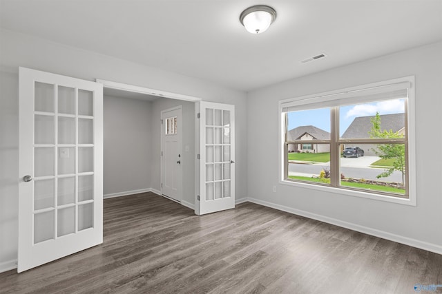103 Gander Cir, Owens Cross Roads, AL 35763 - empty room featuring wood finished floors and french doors