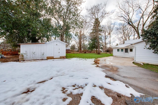 view of yard covered in snow