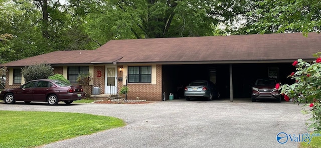 ranch-style house with a carport