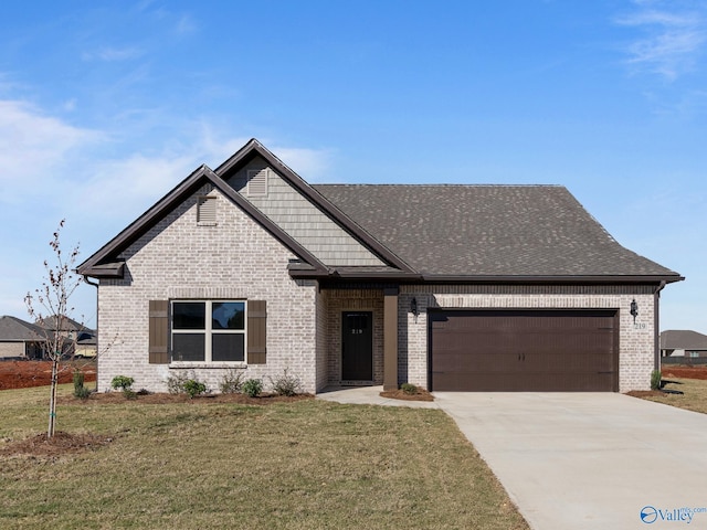 craftsman-style house with a front yard and a garage