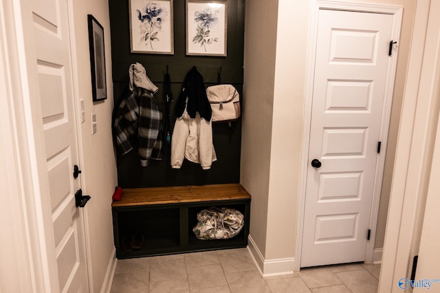 mudroom with light tile patterned floors