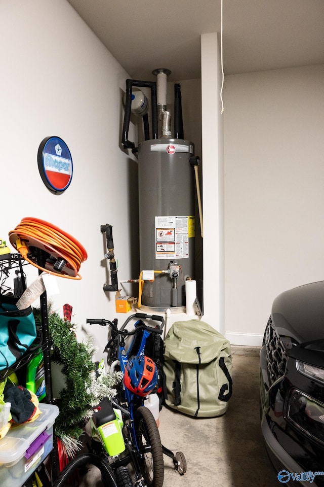 utility room featuring gas water heater