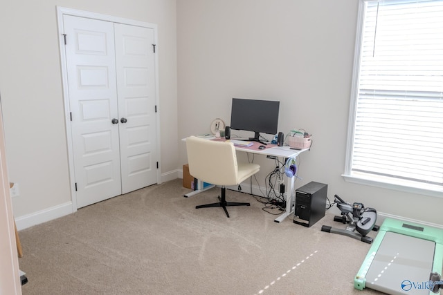 view of carpeted office space