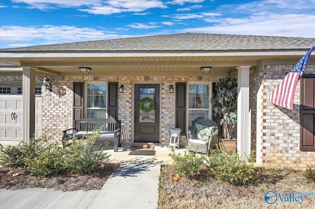 doorway to property with a porch