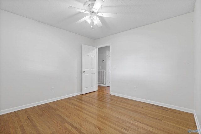 302 Cherry St NW, Hartselle, AL 35640 - unfurnished room featuring light wood-type flooring and a ceiling fan