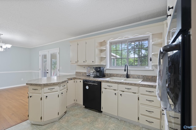 302 Cherry St NW, Hartselle, AL 35640 - kitchen with open shelves, black dishwasher, a peninsula, refrigerator, and a textured ceiling