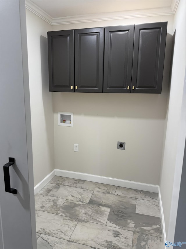 laundry area with ornamental molding, washer hookup, cabinets, and electric dryer hookup