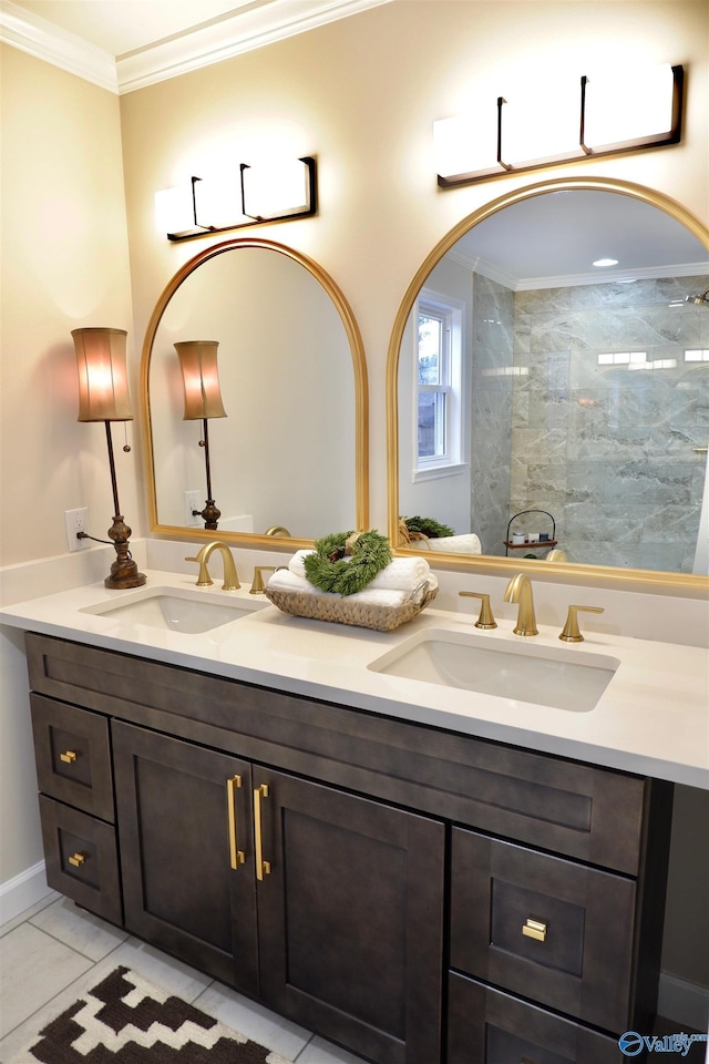 bathroom with vanity, tile patterned flooring, and crown molding