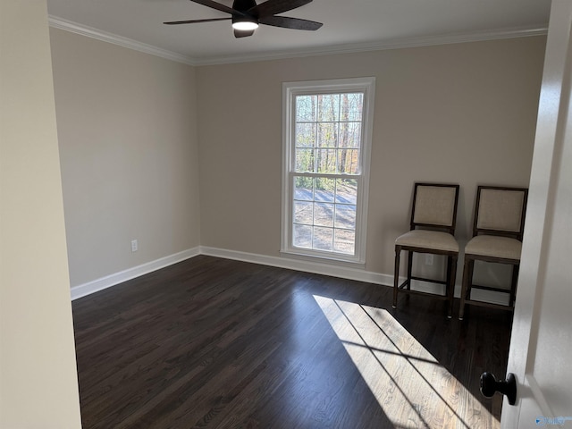 spare room featuring ceiling fan, crown molding, and dark hardwood / wood-style flooring