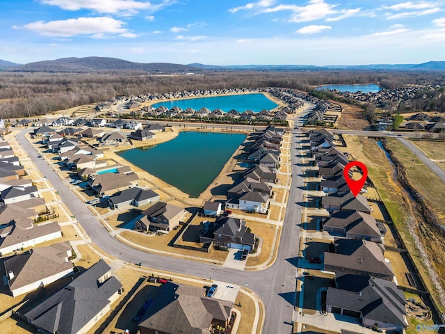 aerial view featuring a residential view and a water and mountain view