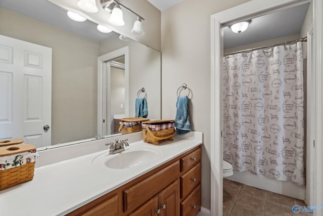 full bathroom featuring toilet, shower / bath combo, vanity, and tile patterned floors