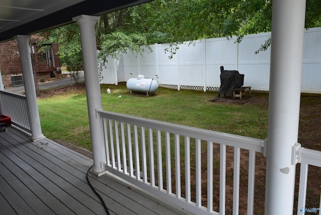 deck featuring a lawn