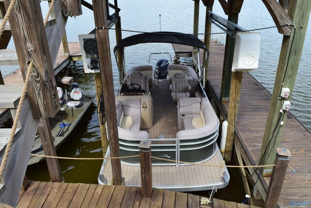 view of dock with a water view