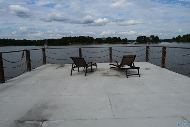 view of patio / terrace featuring a water view