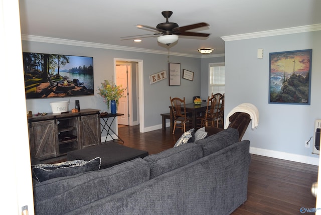 living room with ceiling fan, dark hardwood / wood-style flooring, and ornamental molding