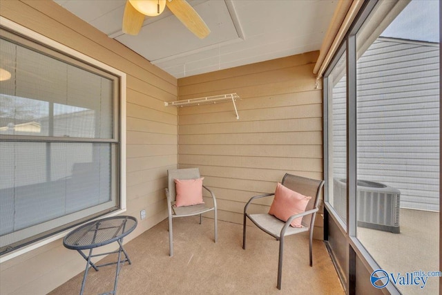 sunroom / solarium with ceiling fan