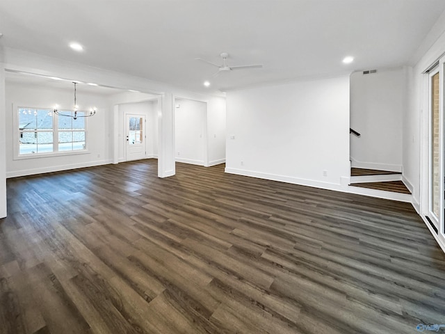 interior space with baseboards, dark wood finished floors, visible vents, and recessed lighting