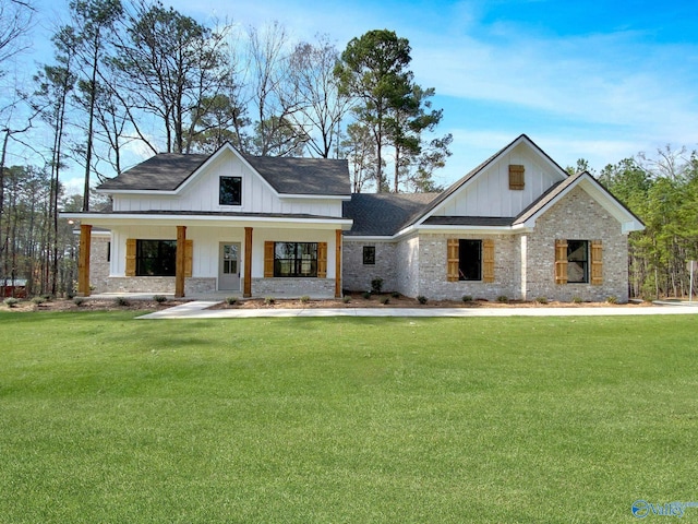 modern farmhouse style home featuring a porch and a front yard