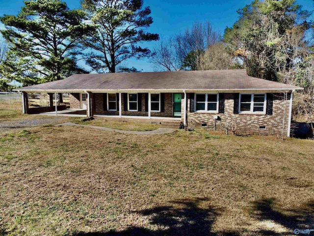 ranch-style home featuring crawl space, a front lawn, an attached carport, and brick siding