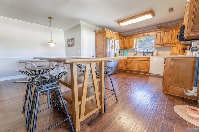1045 Cove Rd, Southside, AL 35907 - kitchen with visible vents, freestanding refrigerator, dark wood-style floors, and white dishwasher