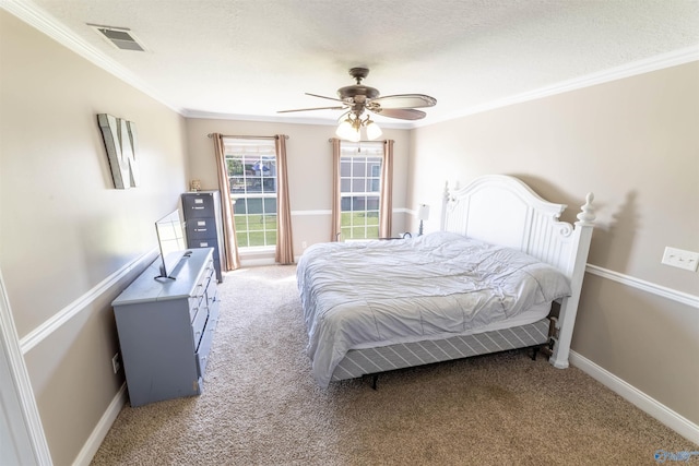 1045 Cove Rd, Southside, AL 35907 - bedroom featuring baseboards, ornamental molding, carpet floors, visible vents, and ceiling fan